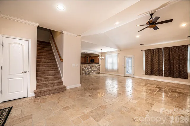 a view of a livingroom with a staircase