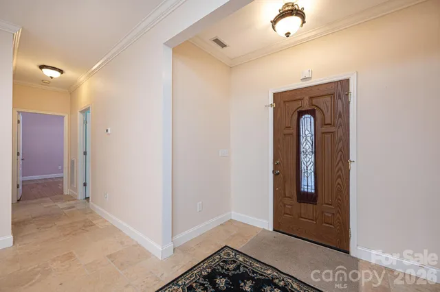 a view of hallway with washer and dryer