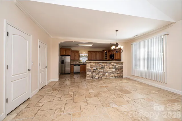 a spacious bathroom with a mirror and a shower