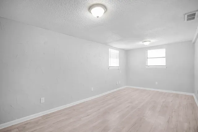 an empty room with a window