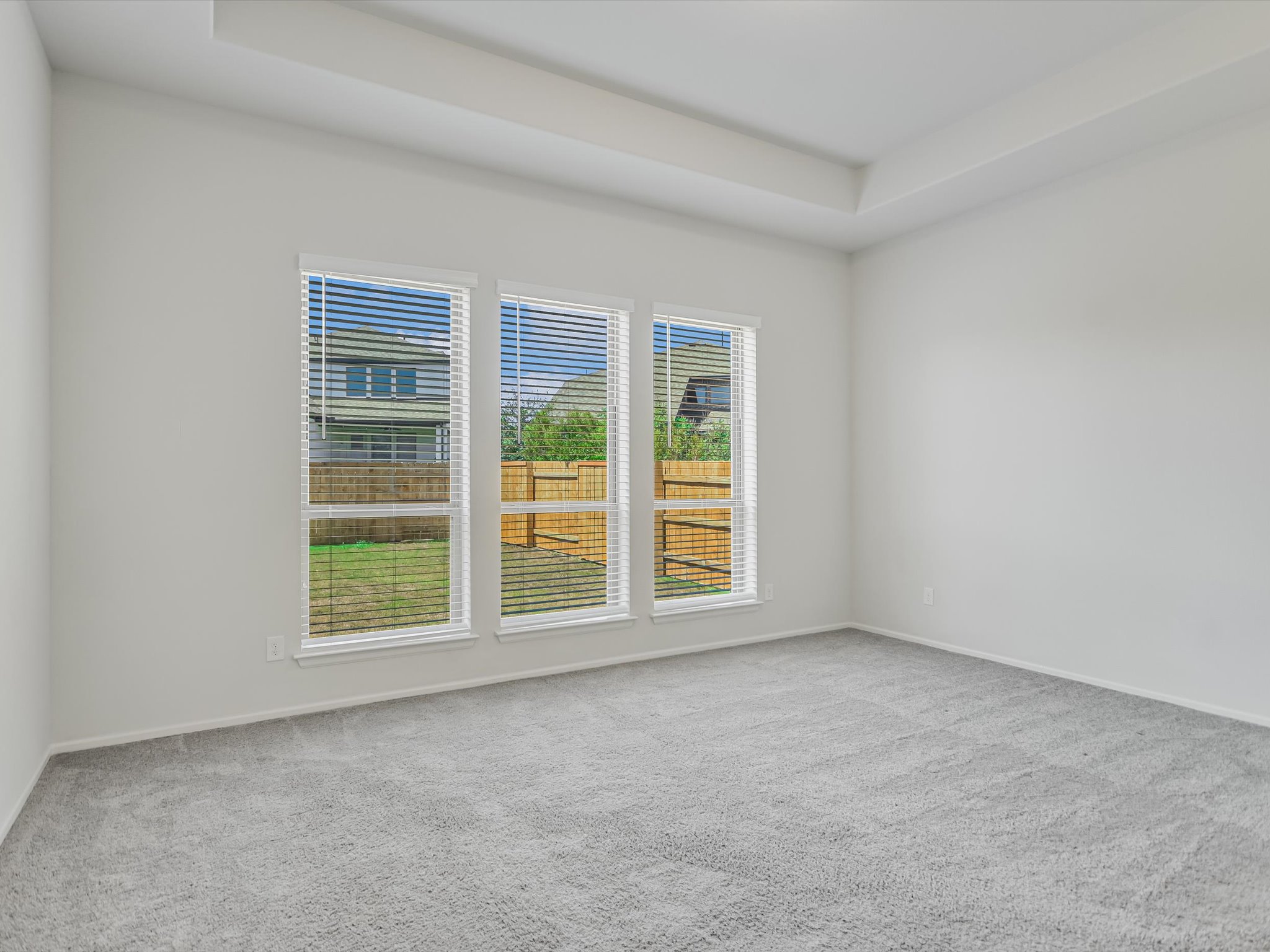 396 Cold Riv Run Kyle, TX 78640 - Photo 11 of 20 an empty room with windows
