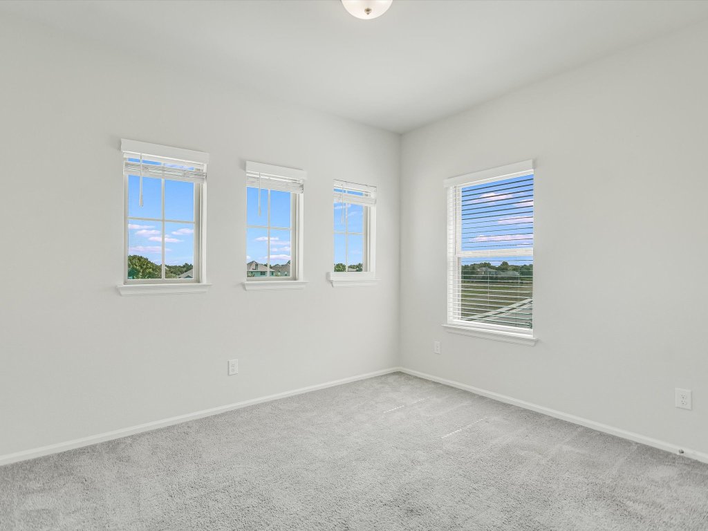 396 Cold Riv Run Kyle, TX 78640 - Photo 15 of 20 an empty room with a window