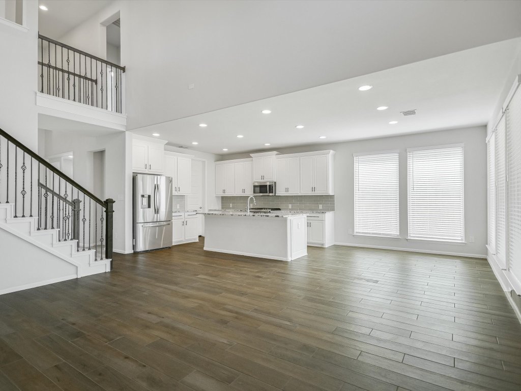 396 Cold Riv Run Kyle, TX 78640 - Photo 8 of 20 a view of kitchen with wooden floor