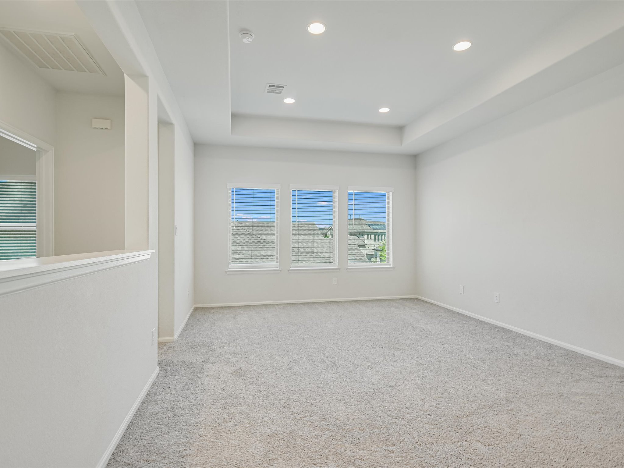 396 Cold Riv Run Kyle, TX 78640 - Photo 10 of 20 an empty room with windows