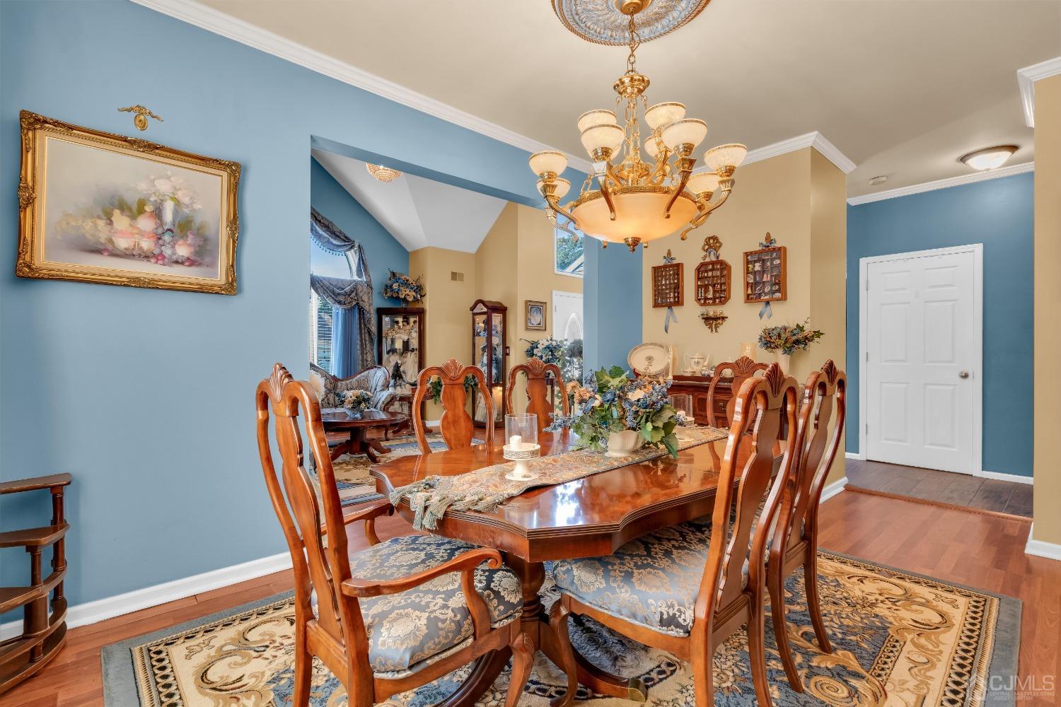 1416 Princess Avenue Brick, NJ 08724 - Photo 11 of 39 a view of a dining room with furniture and wooden floor