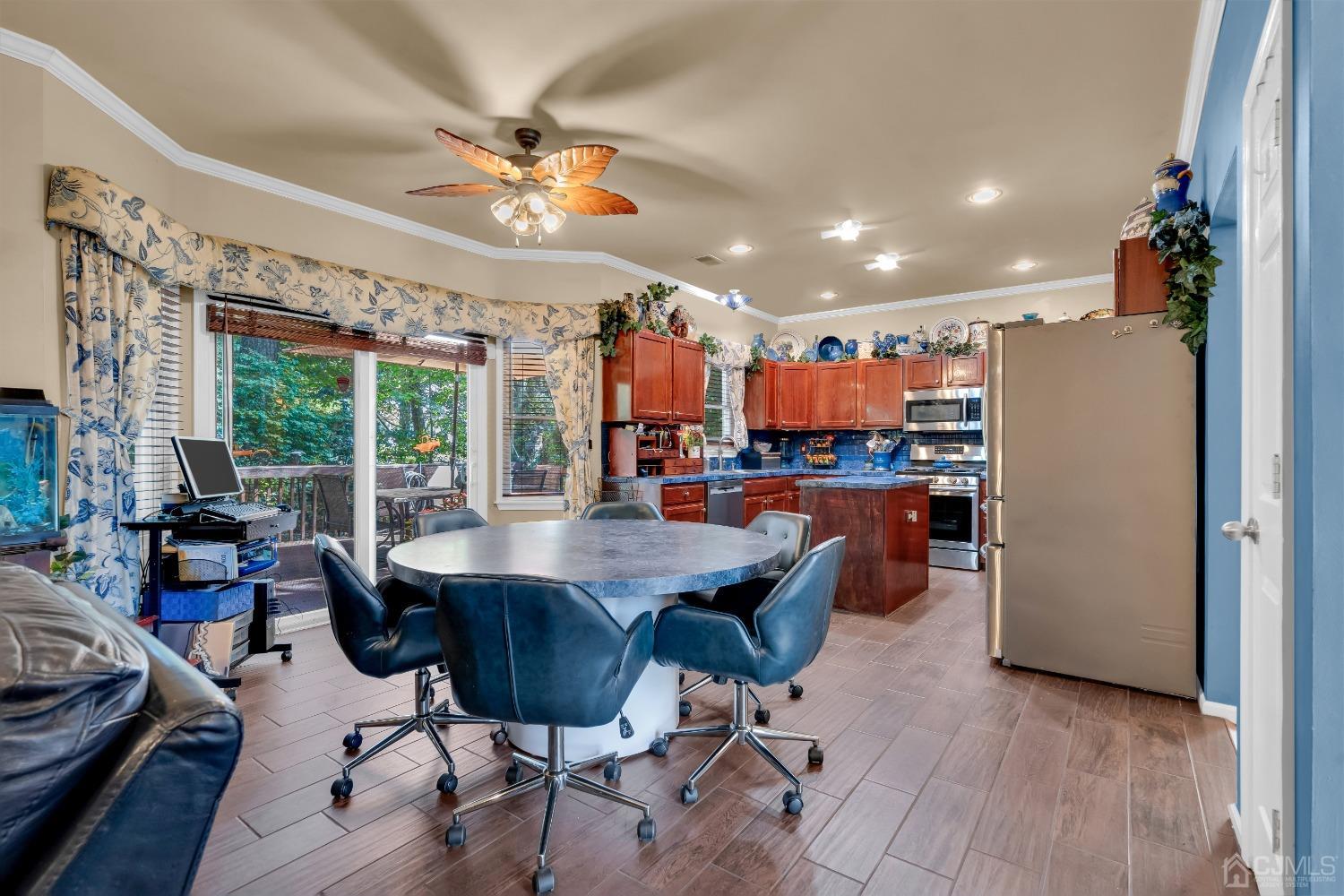 1416 Princess Avenue Brick, NJ 08724 - Photo 16 of 39 a view of a dining room with furniture window and wooden floor