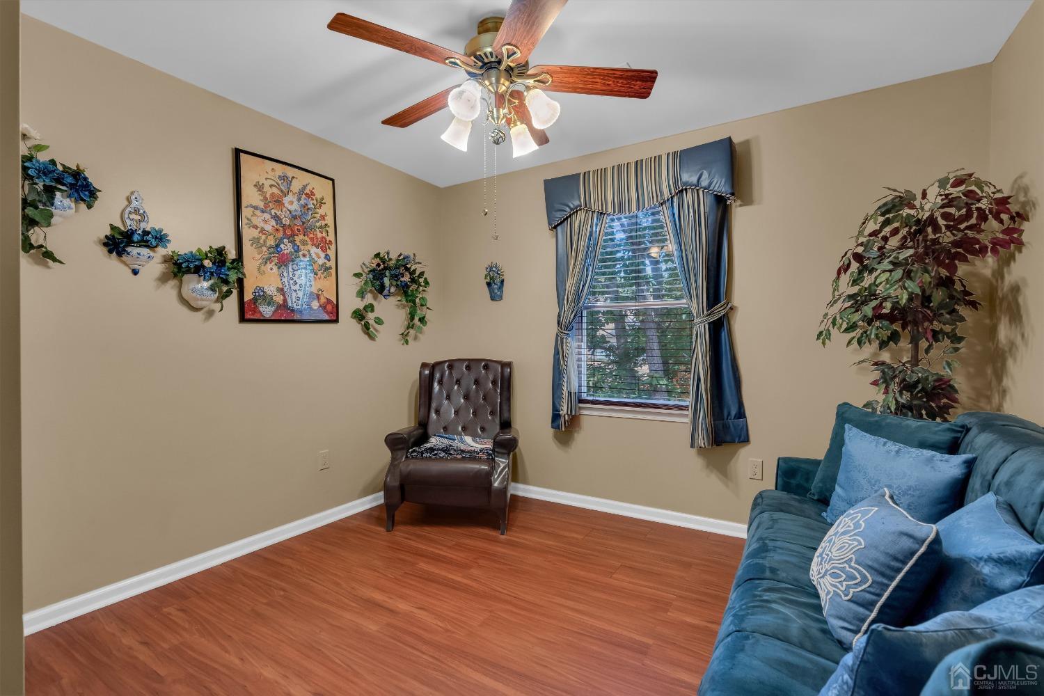1416 Princess Avenue Brick, NJ 08724 - Photo 29 of 39 a living room with furniture and a potted plant