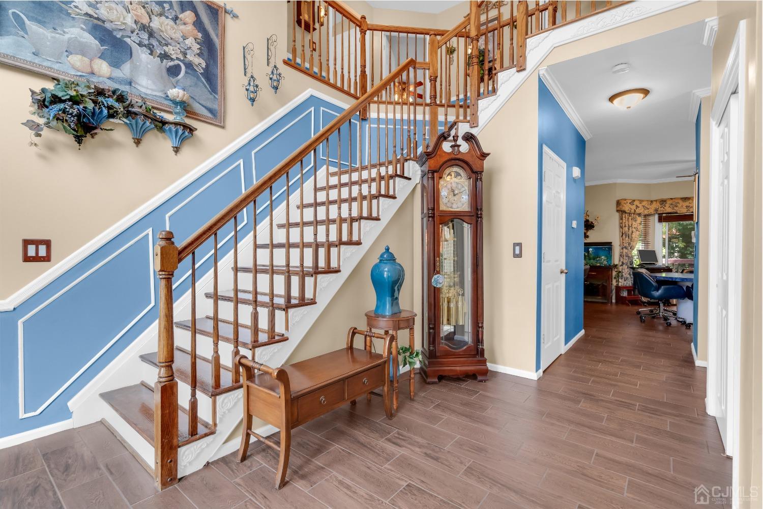 1416 Princess Avenue Brick, NJ 08724 - Photo 5 of 39 a view of entryway with wooden floor and stairs