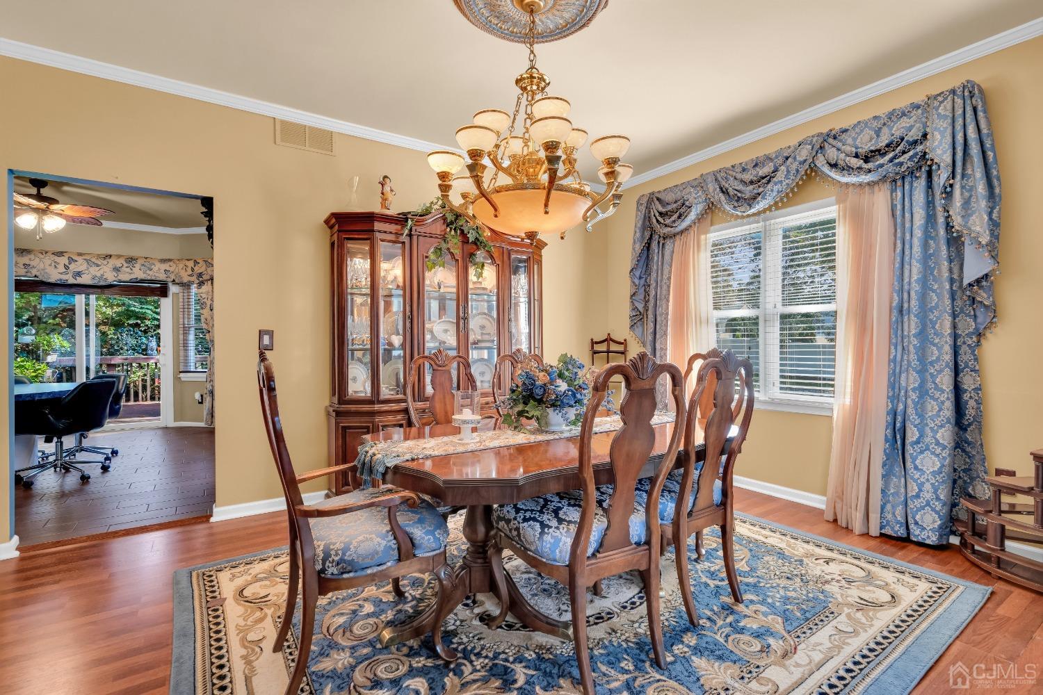 1416 Princess Avenue Brick, NJ 08724 - Photo 10 of 39 a view of a dining room with furniture window and wooden floor