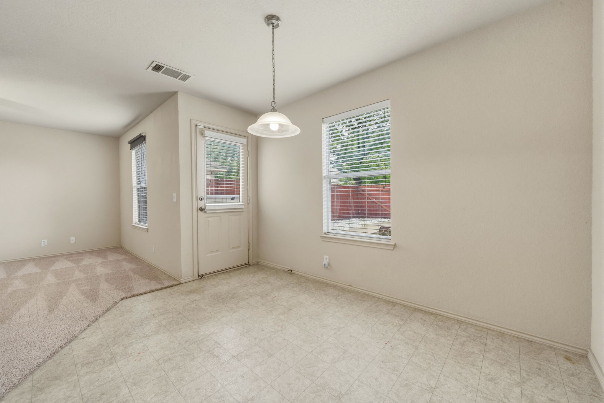 4528 Best Way Austin, TX 78725 - Photo 14 of 40 Unfurnished dining area with light floors and baseboards