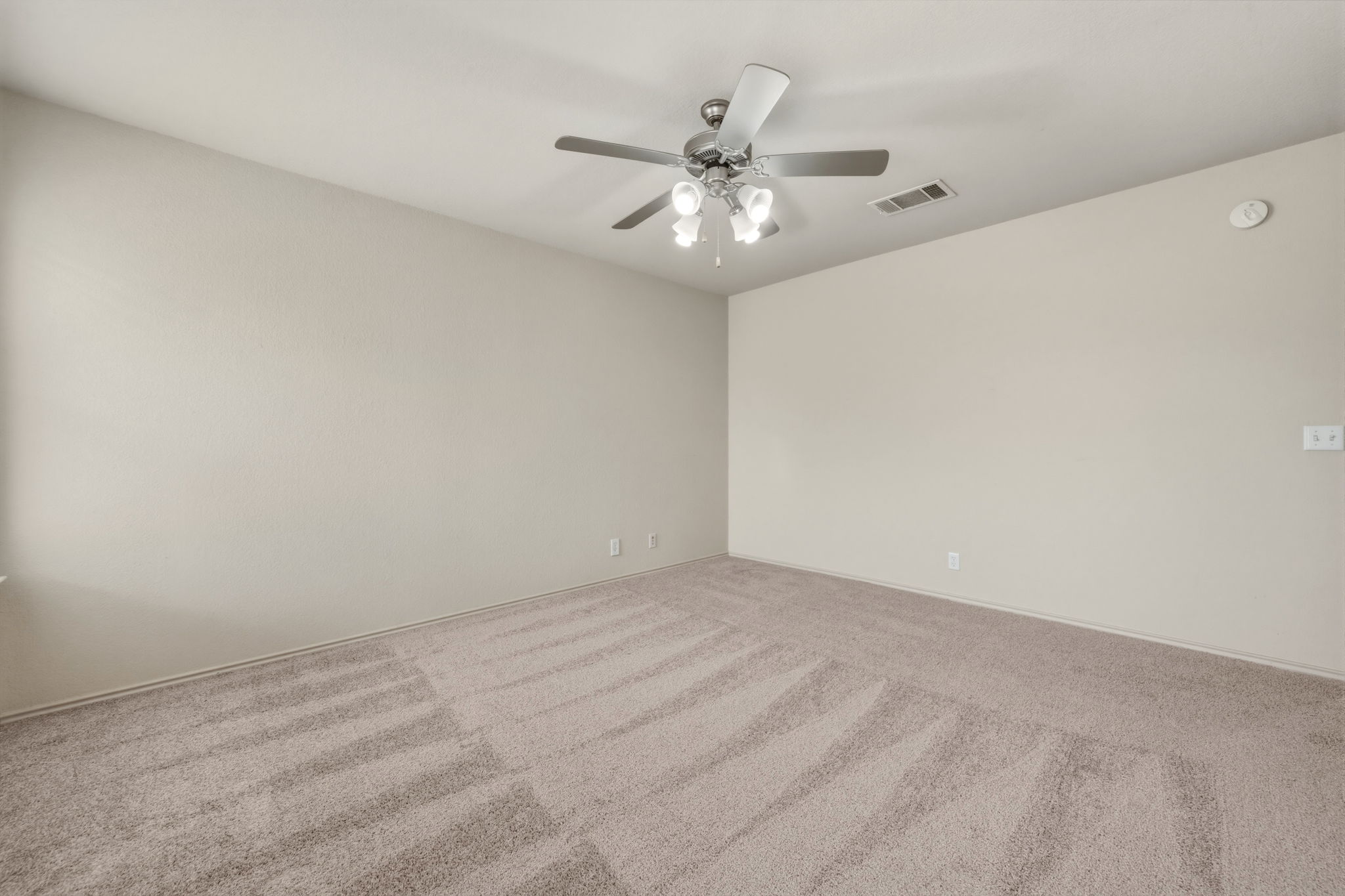 4528 Best Way Austin, TX 78725 - Photo 31 of 40 Unfurnished room with carpet flooring and ceiling fan