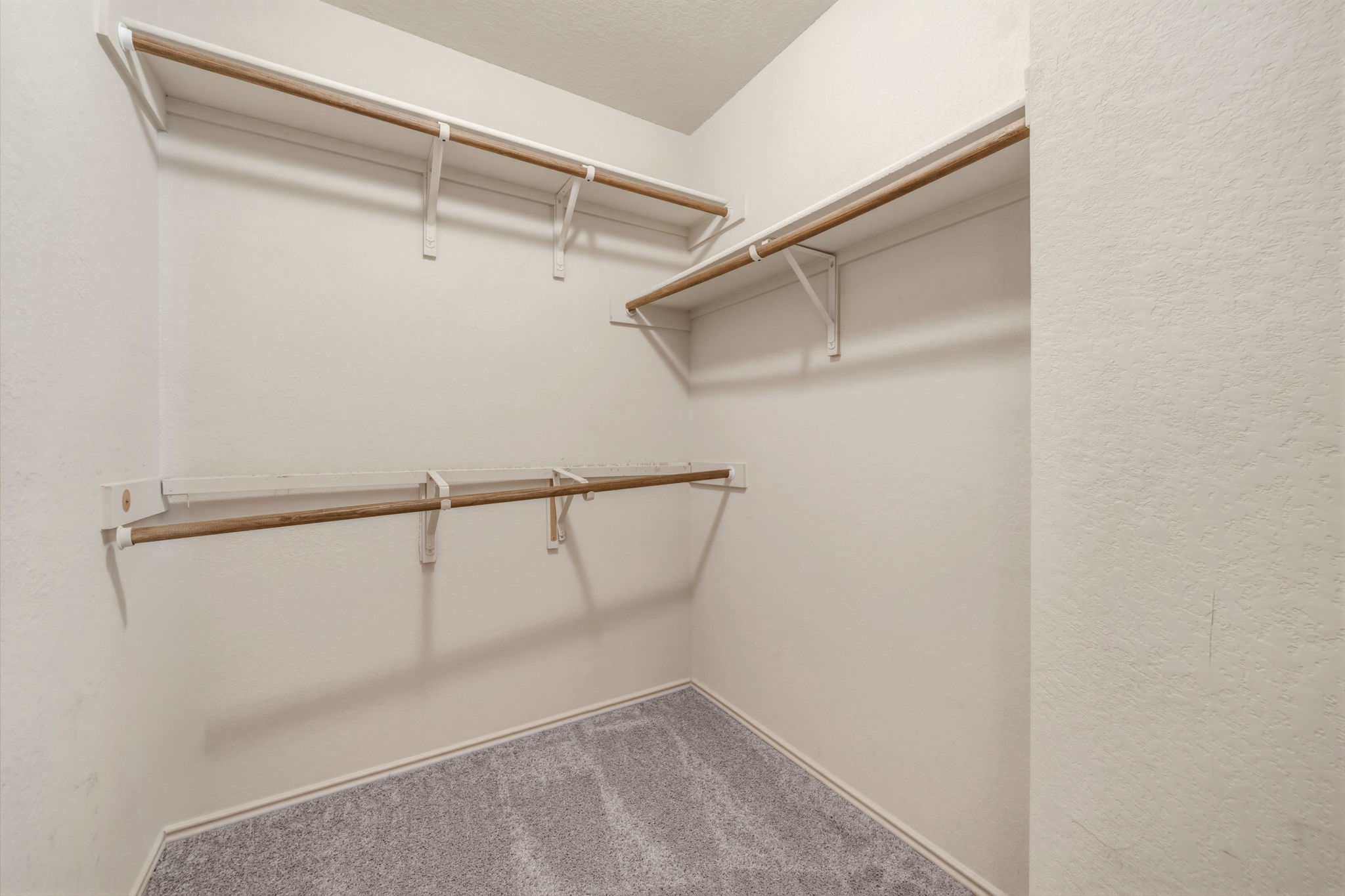 4528 Best Way Austin, TX 78725 - Photo 32 of 40 Walk in closet with dark colored carpet