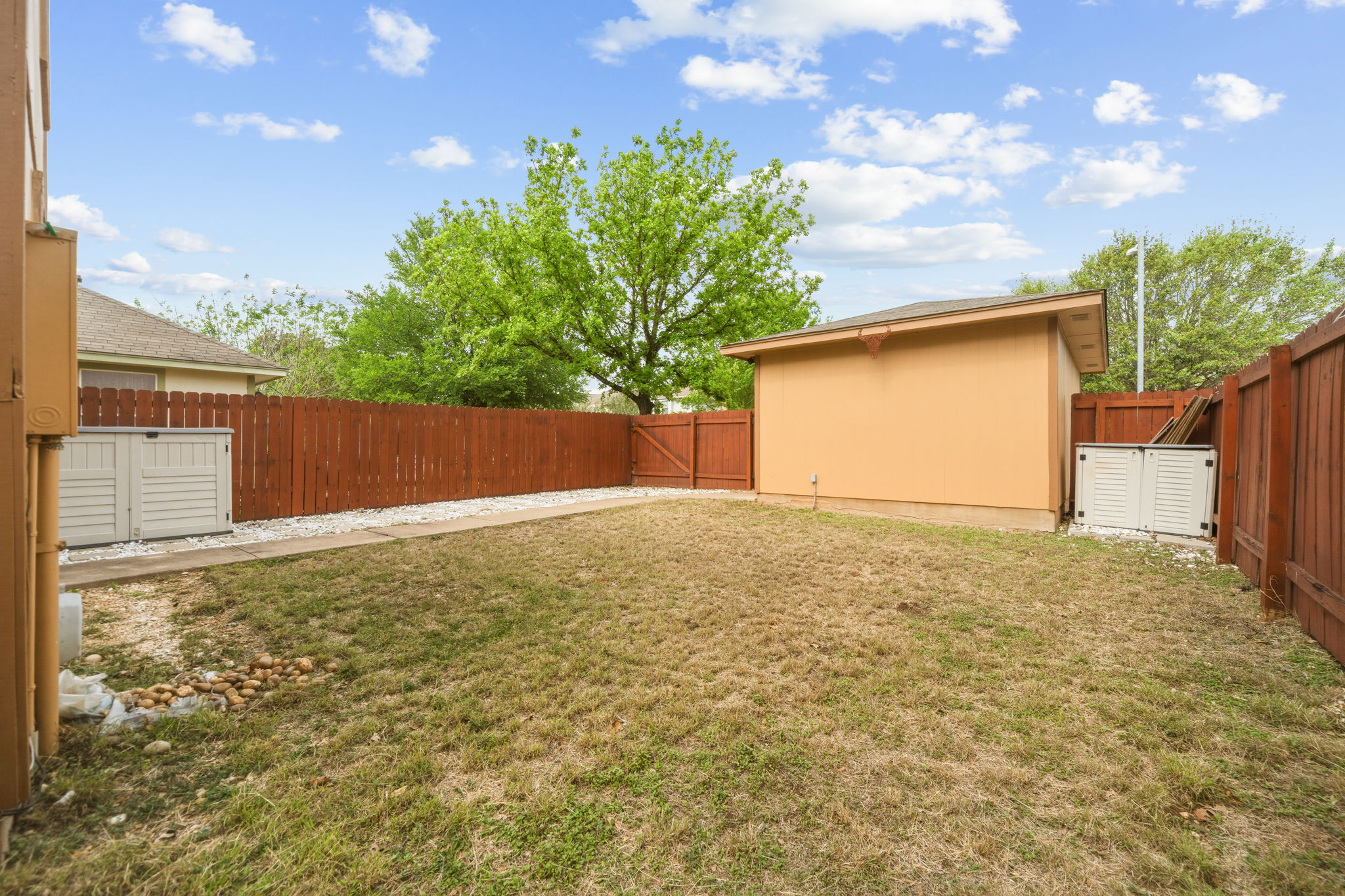 4528 Best Way Austin, TX 78725 - Photo 37 of 40 Fenced backyard featuring a gate
