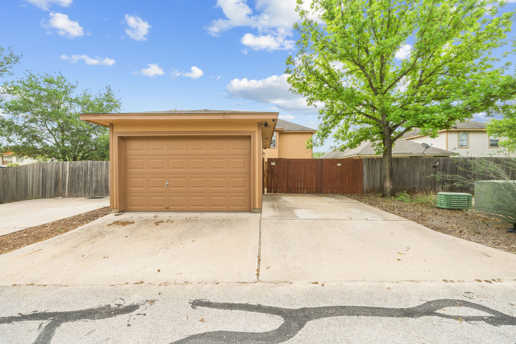 4528 Best Way Austin, TX 78725 - Photo 38 of 40 Garage featuring driveway