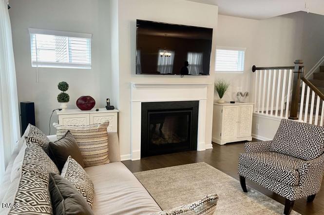 1807 Wrenn Road Durham, NC 27703 - Photo 9 of 43 a living room with furniture and a fireplace