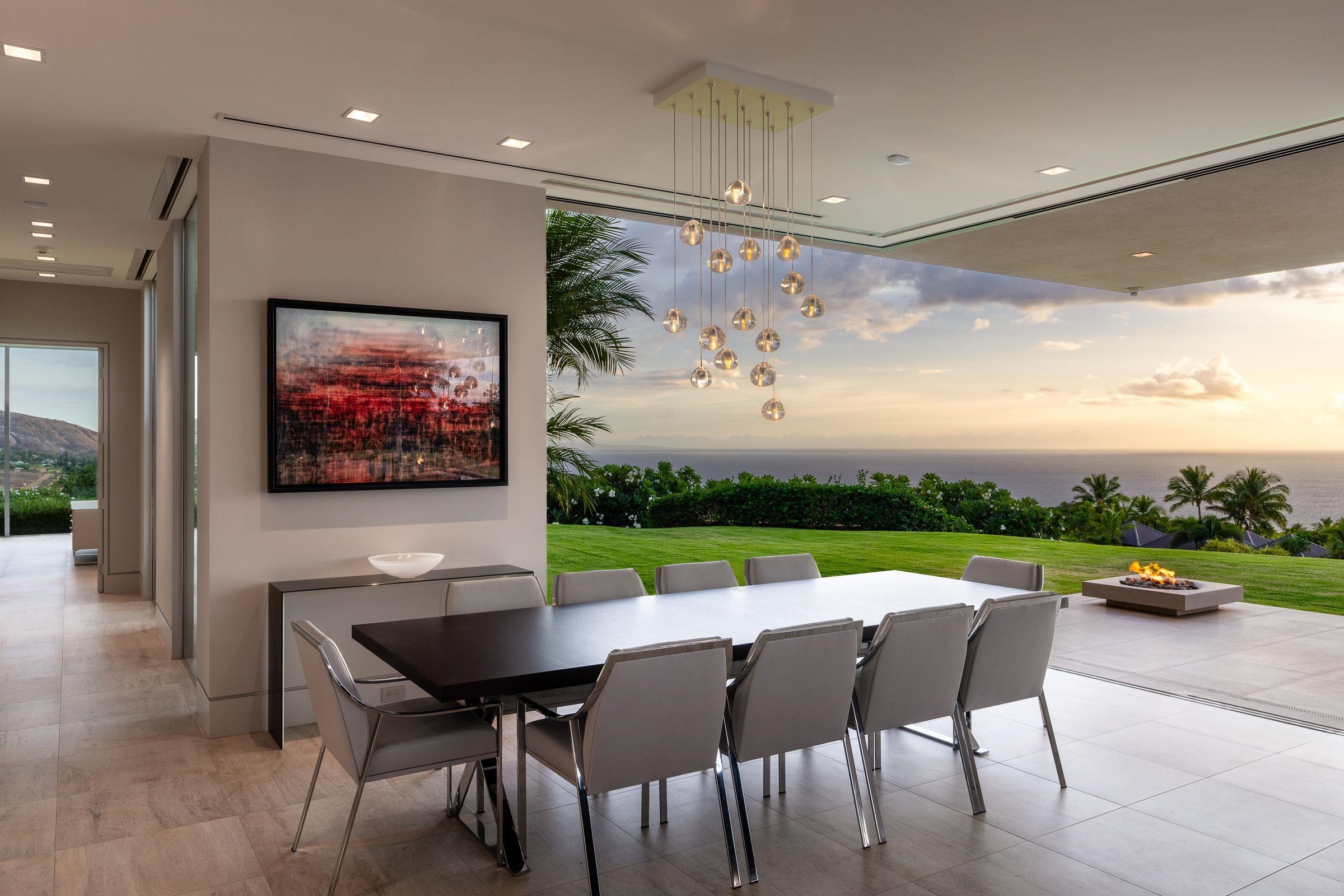 936 Punakea Loop Lahaina, HI 96761 - Photo 32 of 35 a view of a dining room with furniture and a floor to ceiling window