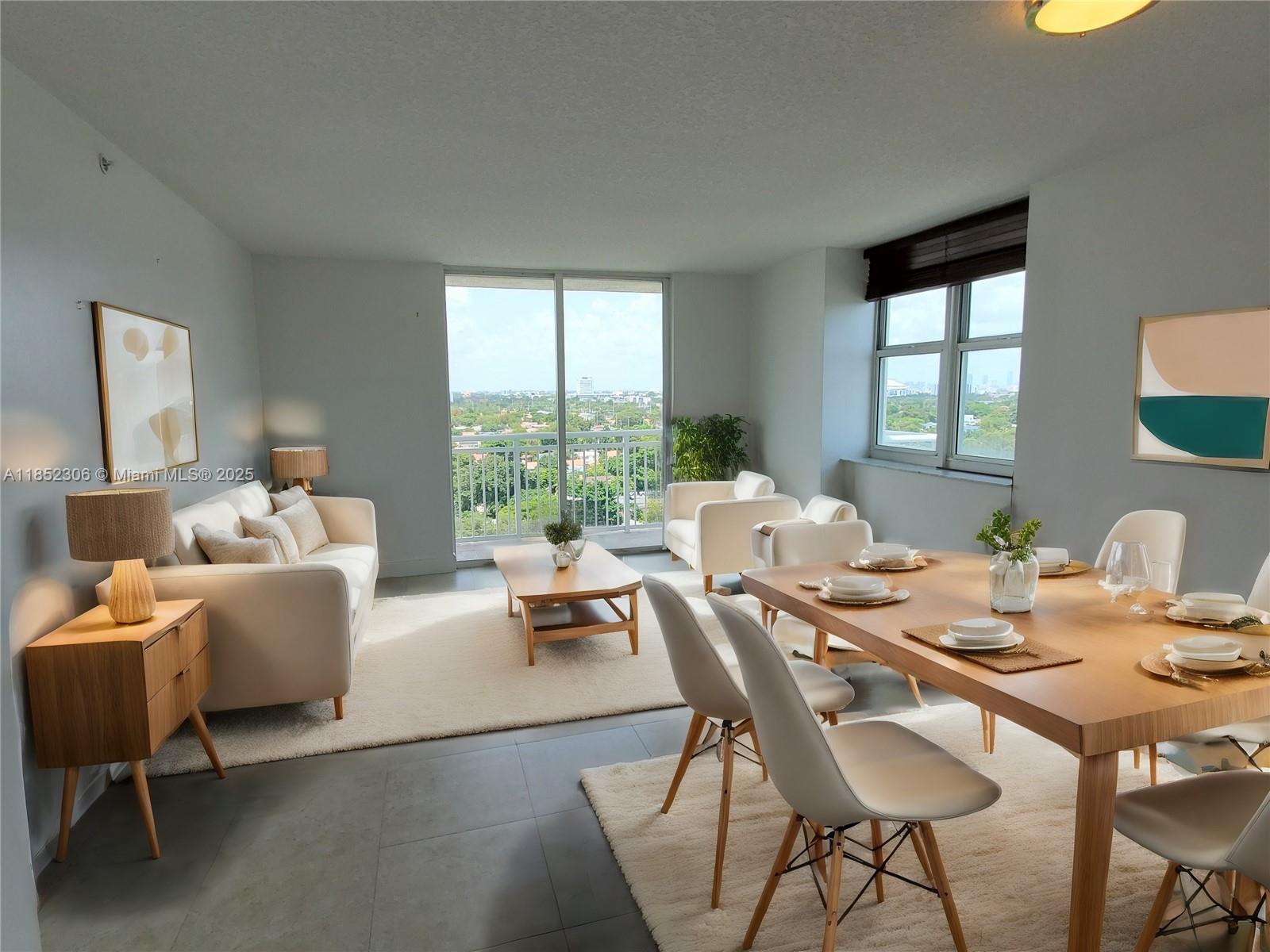 3000 Coral Way, Unit 1121 Miami, FL 33145 - Photo 1 of 12 a living room with furniture and a large window
