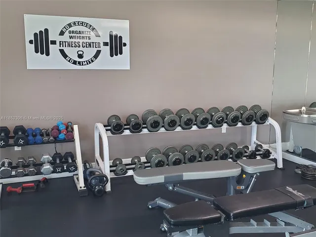 a view of a workspace with furniture