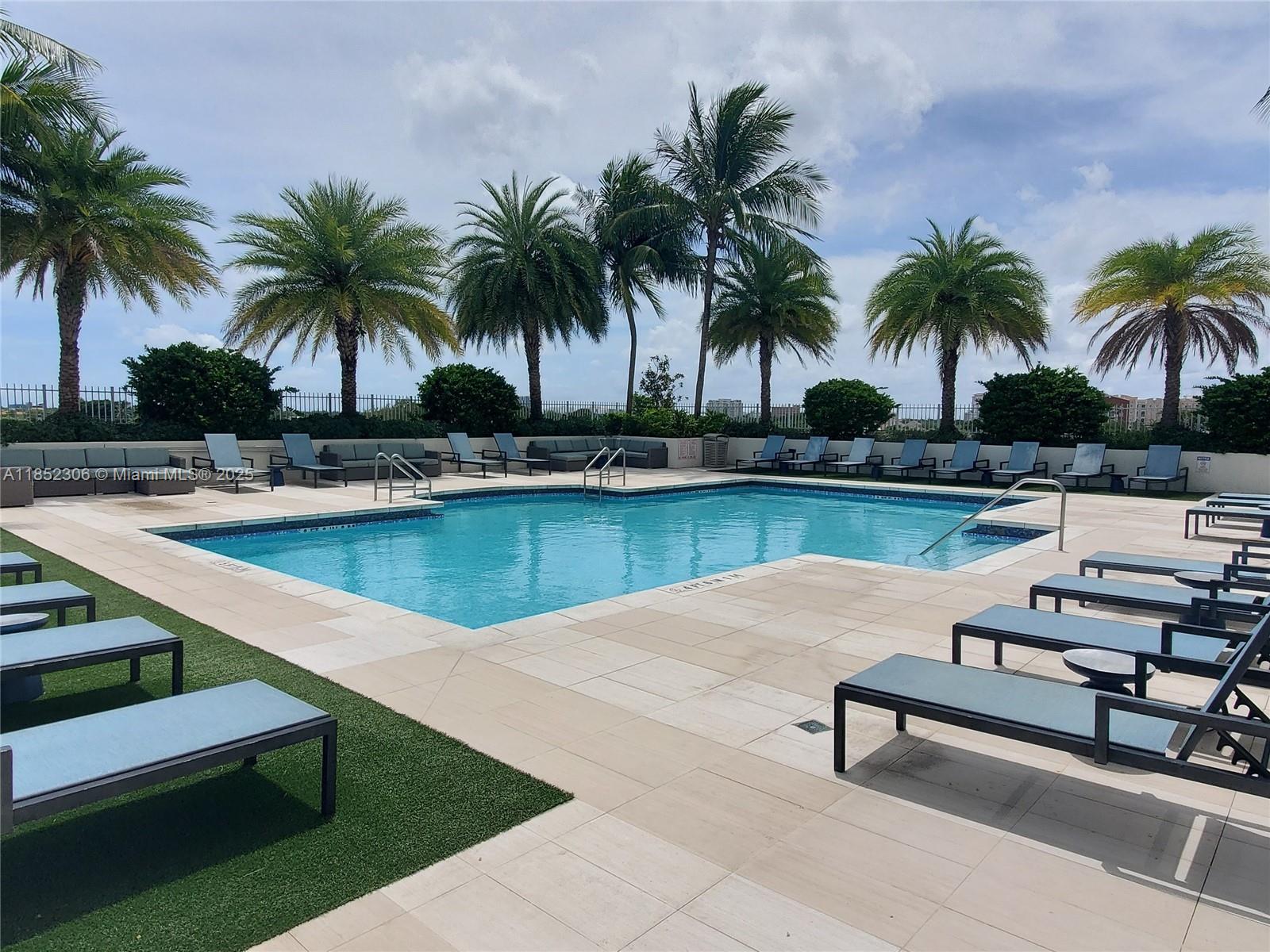 3000 Coral Way, Unit 1121 Miami, FL 33145 - Photo 6 of 12 a view of outdoor space with seating area and swimming pool
