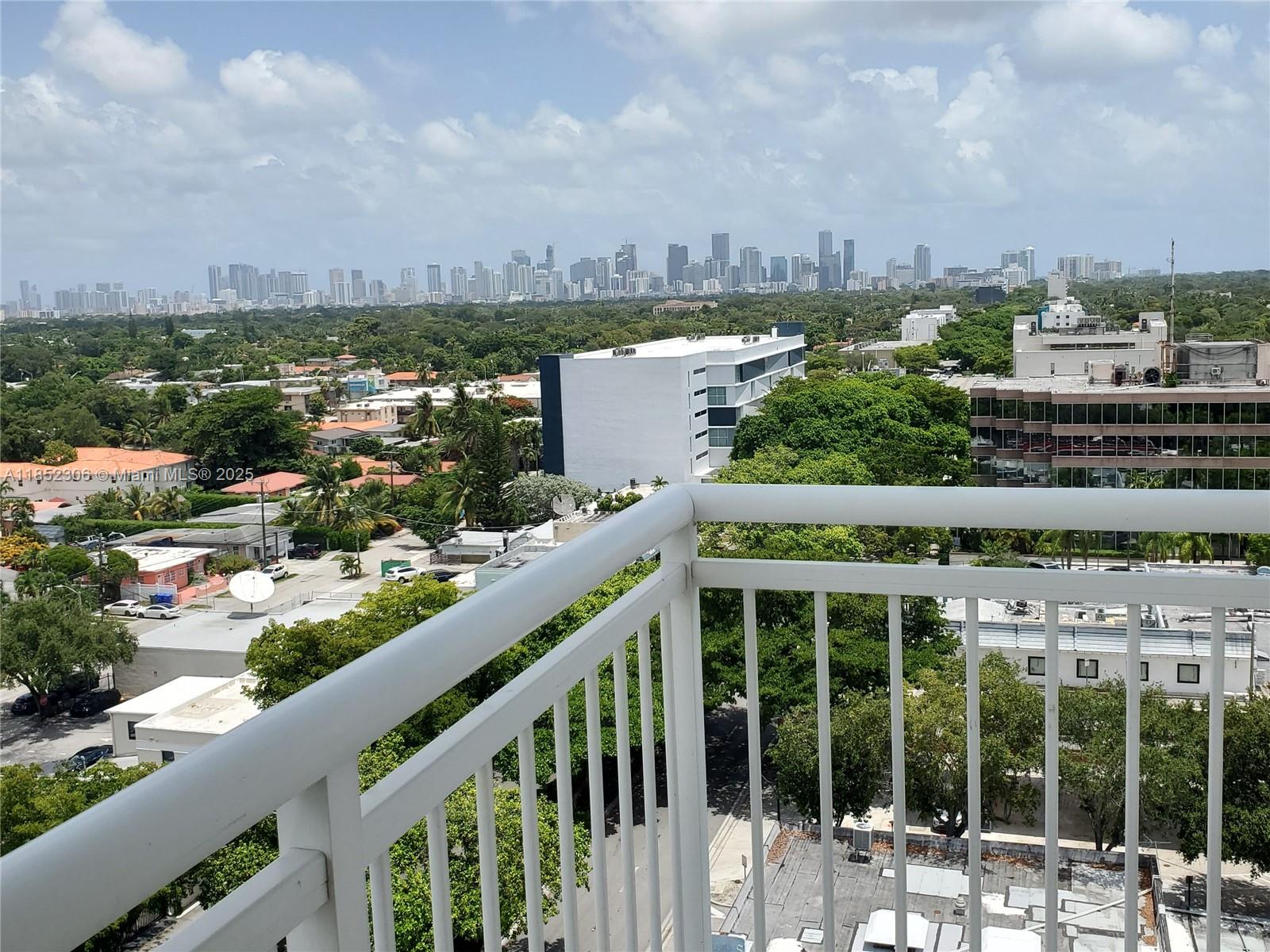 3000 Coral Way, Unit 1121 Miami, FL 33145 - Photo 7 of 12 a view of a city from a balcony