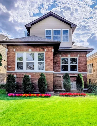 a front view of house with yard