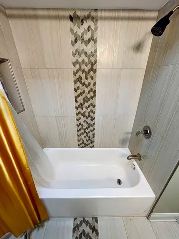 a bathroom with a bathtub