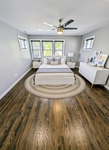 a living room with couch and a window