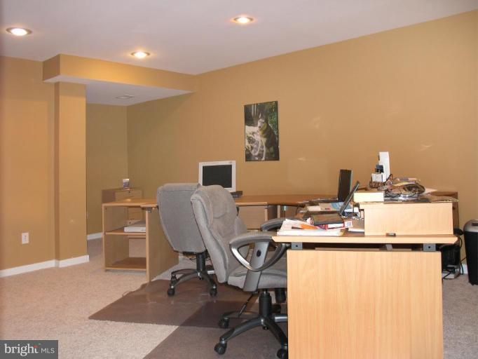 11329 Woodbrook Lane Reston, VA 20194 - Photo 22 of 30 a view of a workspace with furniture