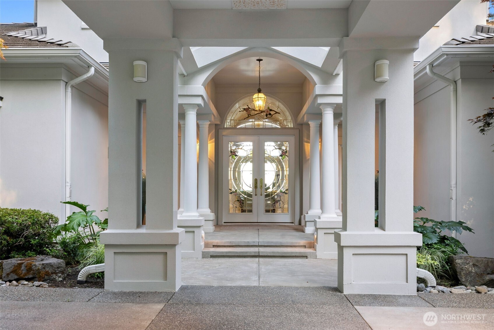 13020 Thomas Road Northwest Gig Harbor, WA 98329 - Photo 13 of 37 a front view of a house with a porch