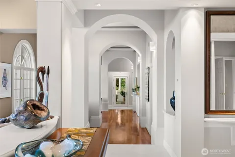 a bed room with a bed and a chair