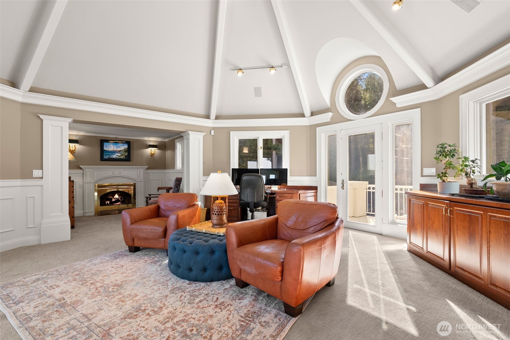 13020 Thomas Road Northwest Gig Harbor, WA 98329 - Photo 28 of 37 a living room with furniture a clock and a large window
