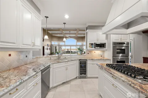 a dining room with furniture and a fireplace