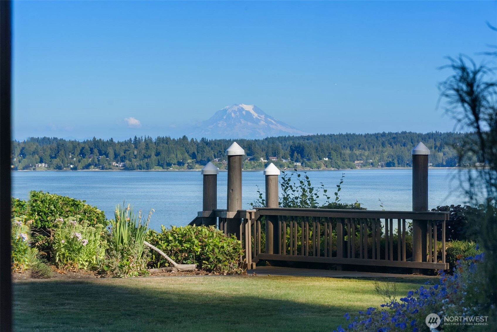 13020 Thomas Road Northwest Gig Harbor, WA 98329 - Photo 9 of 37 a view of a house with a yard