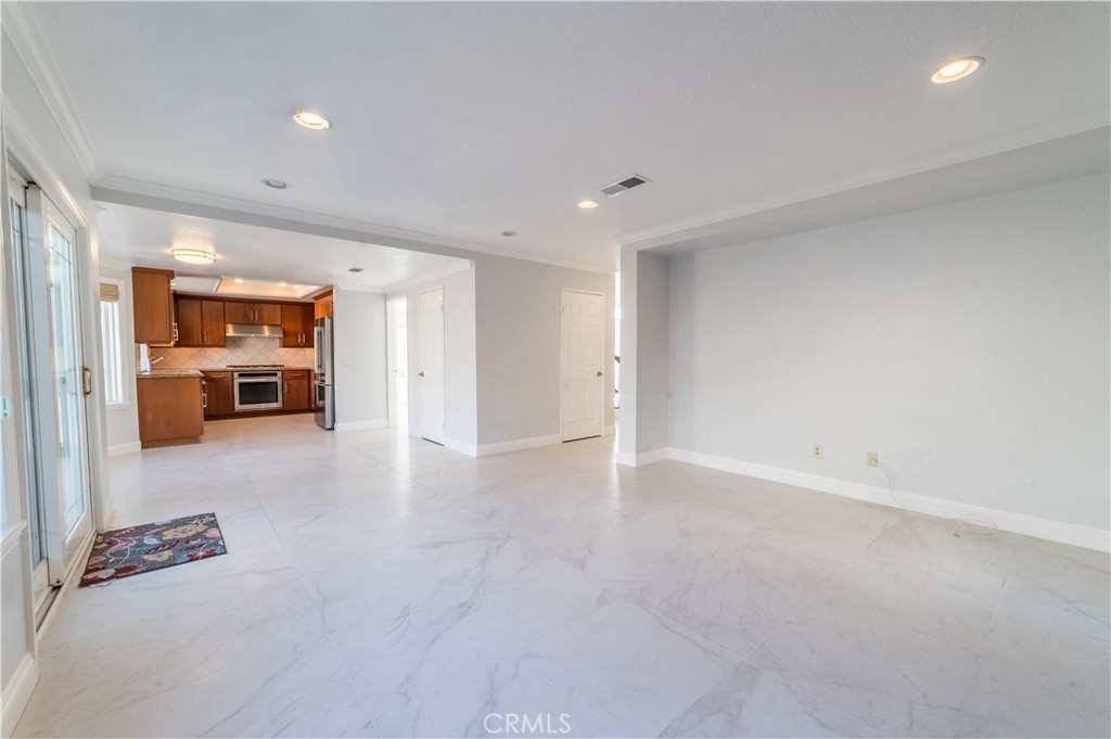23971 Frigate Drive Laguna Niguel, CA 92677 - Photo 12 of 48 an empty room with furniture and view of bedroom