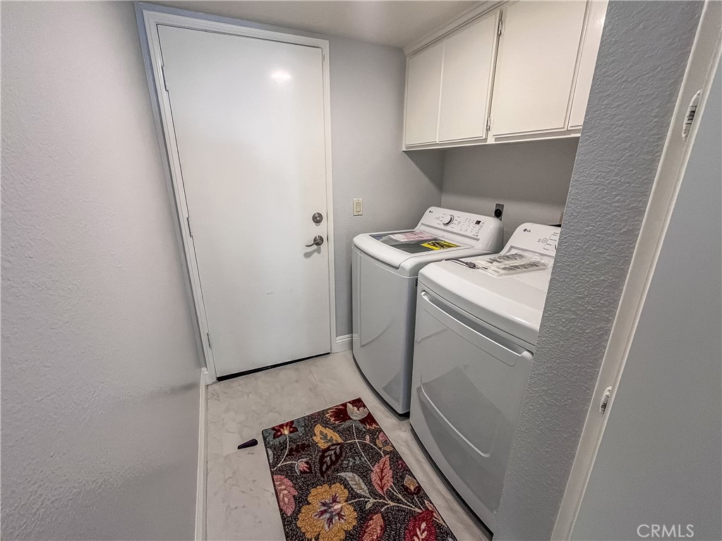 23971 Frigate Drive Laguna Niguel, CA 92677 - Photo 19 of 48 a utility room with dryer and washer