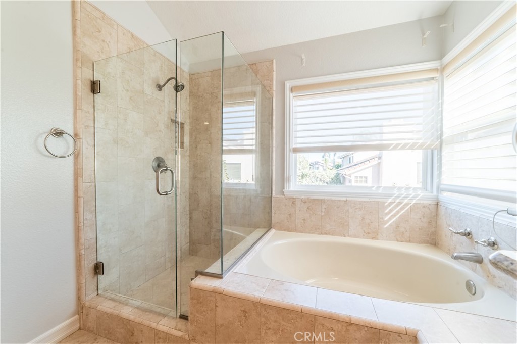 23971 Frigate Drive Laguna Niguel, CA 92677 - Photo 27 of 48 a bathroom with a bathtub and shower