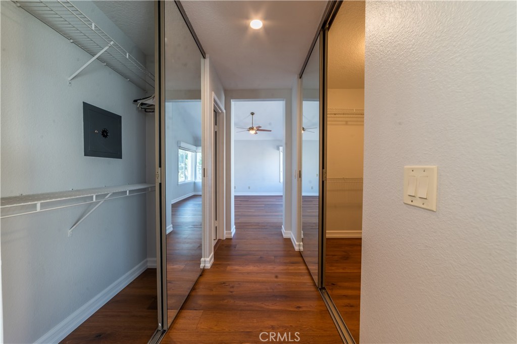 23971 Frigate Drive Laguna Niguel, CA 92677 - Photo 29 of 48 a view of a hallway with wooden floor and a bathroom