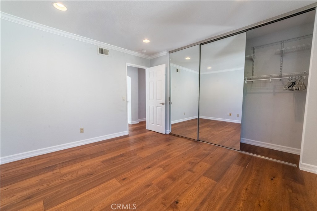 23971 Frigate Drive Laguna Niguel, CA 92677 - Photo 32 of 48 a view of an empty room with wooden floor