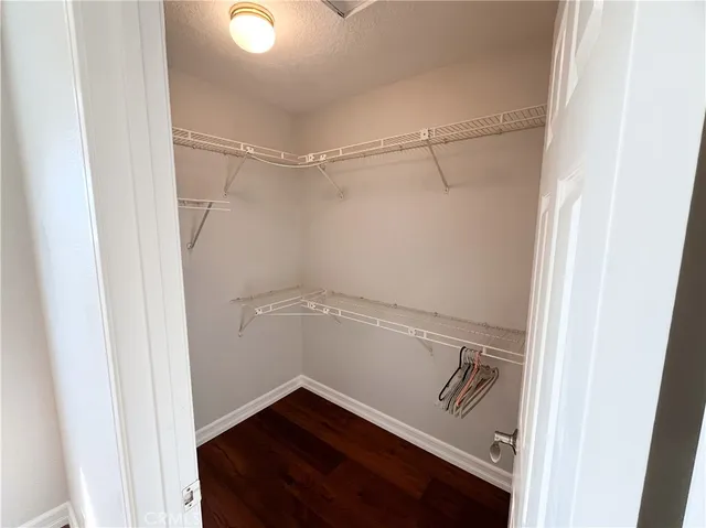 a view of an empty walk in closet