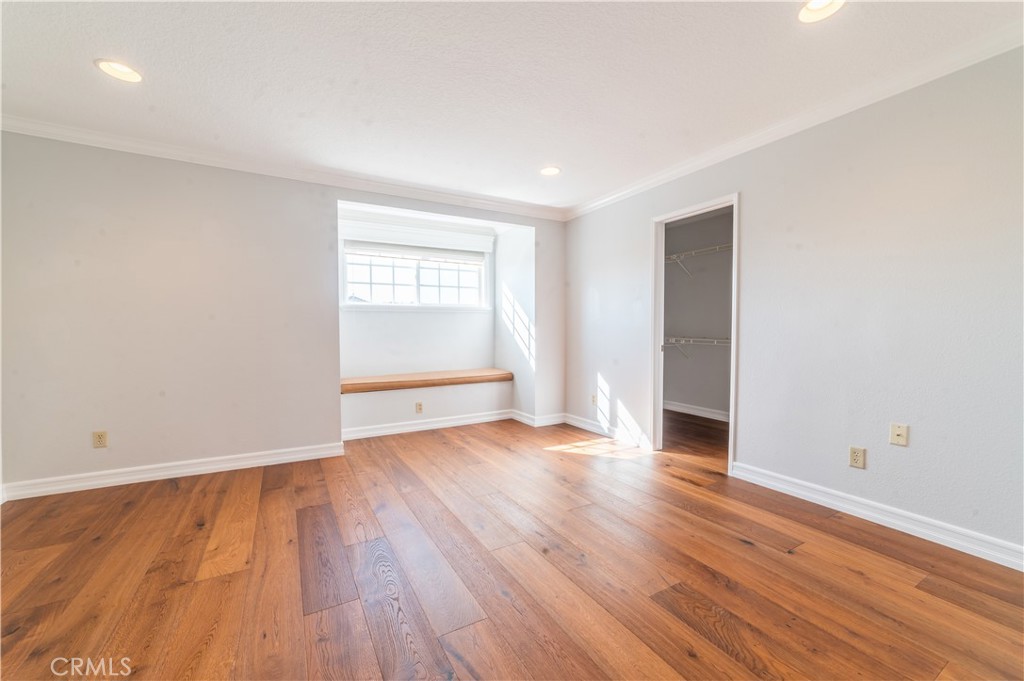 23971 Frigate Drive Laguna Niguel, CA 92677 - Photo 35 of 48 a view of an empty room with wooden floor and a window