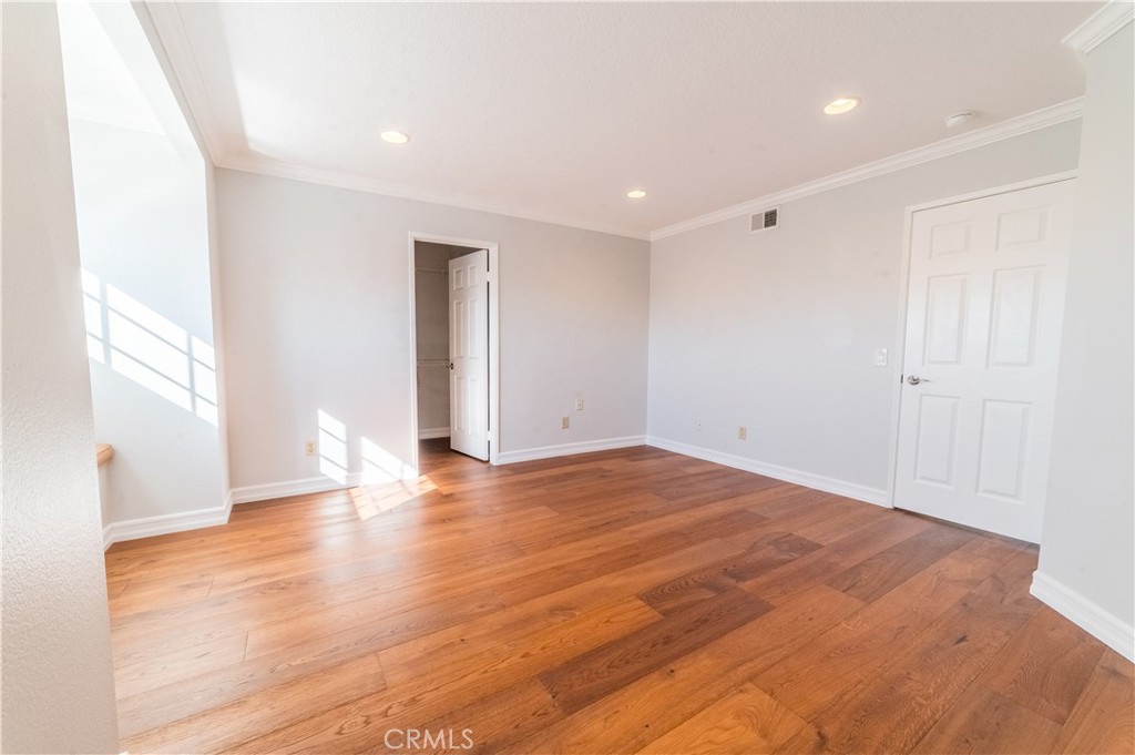 23971 Frigate Drive Laguna Niguel, CA 92677 - Photo 37 of 48 a view of empty room with wooden floor and fan