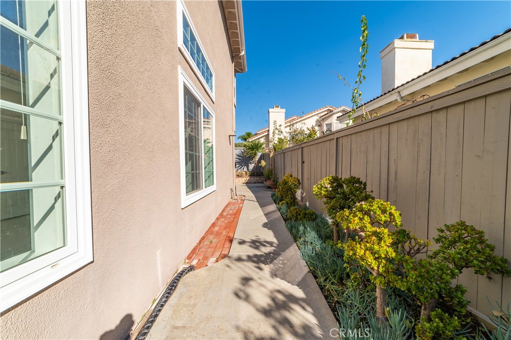 23971 Frigate Drive Laguna Niguel, CA 92677 - Photo 43 of 48 a backyard of a house with flower plants