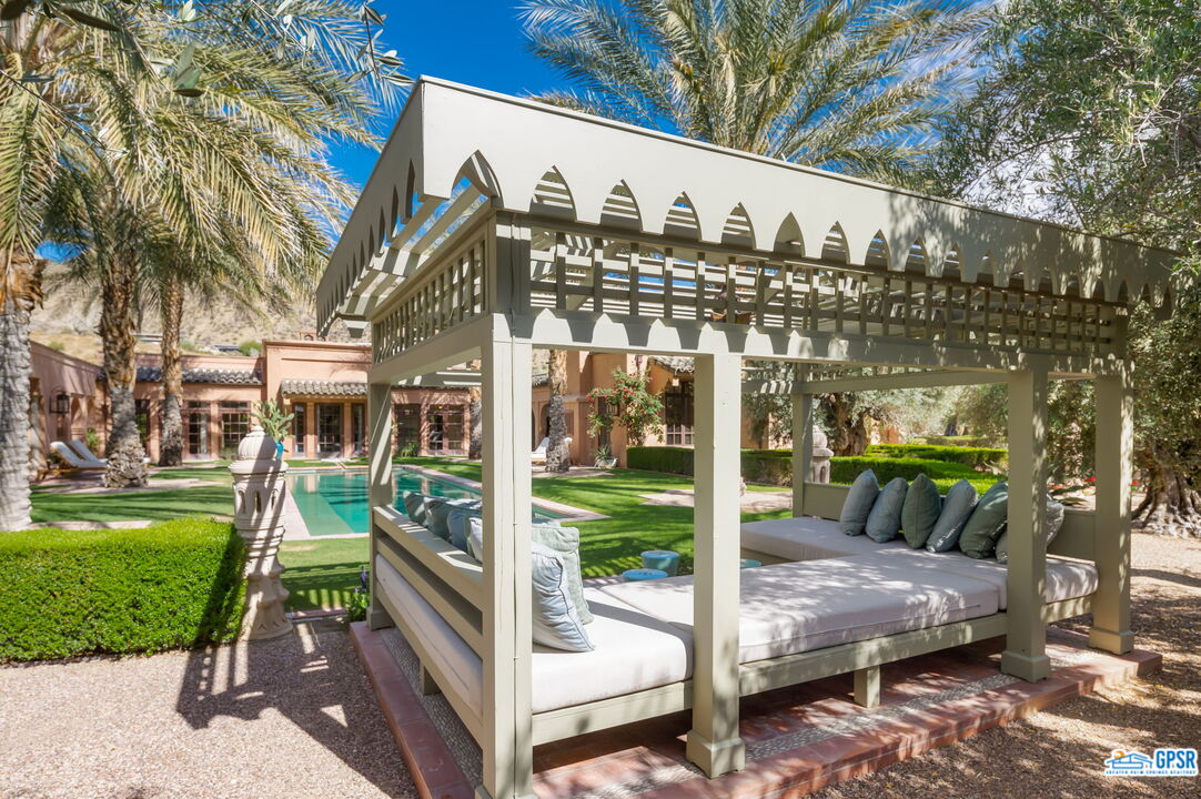 1650 Ave Sevilla Palm Springs, CA 92264 - Photo 12 of 74 a view of a porch with yard and sitting area