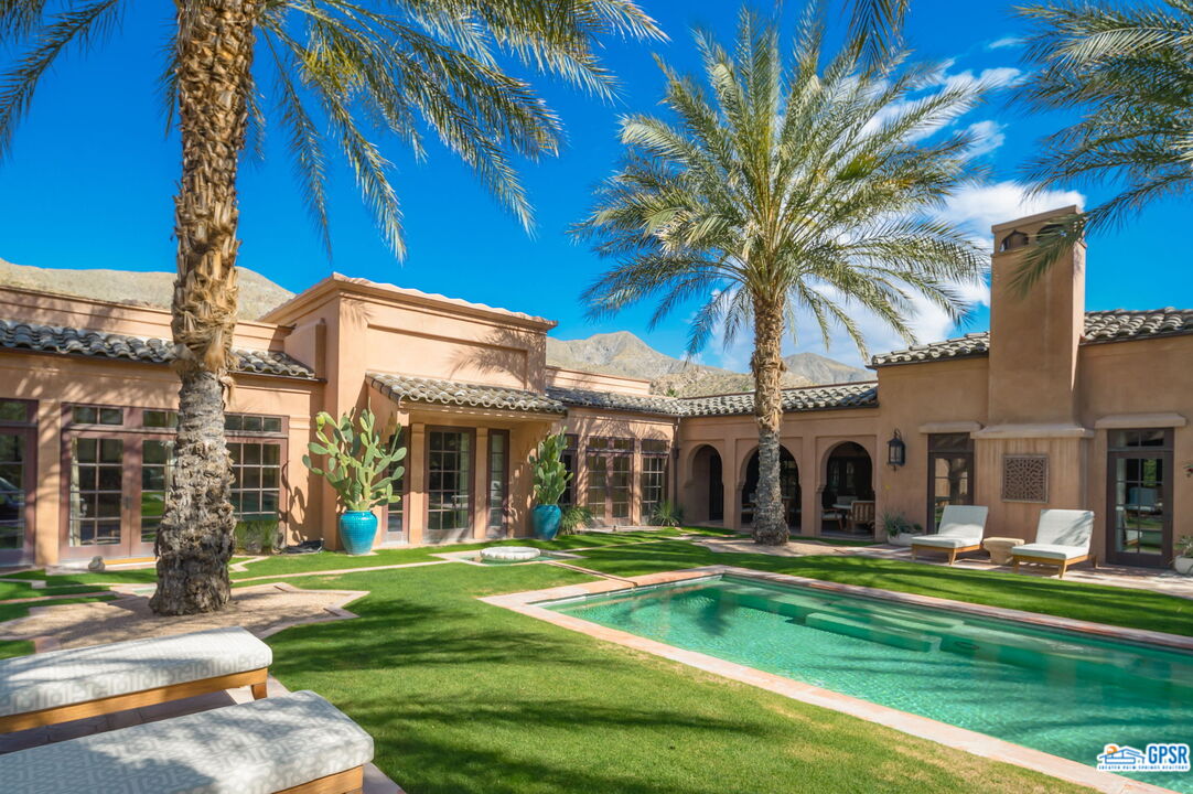 1650 Ave Sevilla Palm Springs, CA 92264 - Photo 15 of 74 a view of a house with a yard