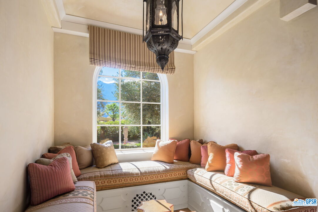 1650 Ave Sevilla Palm Springs, CA 92264 - Photo 29 of 74 a living room with furniture and a window