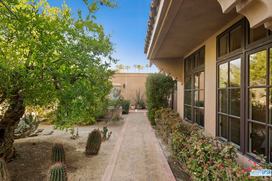 1650 Ave Sevilla Palm Springs, CA 92264 - Photo 55 of 74 a view of house with patio outdoor seating