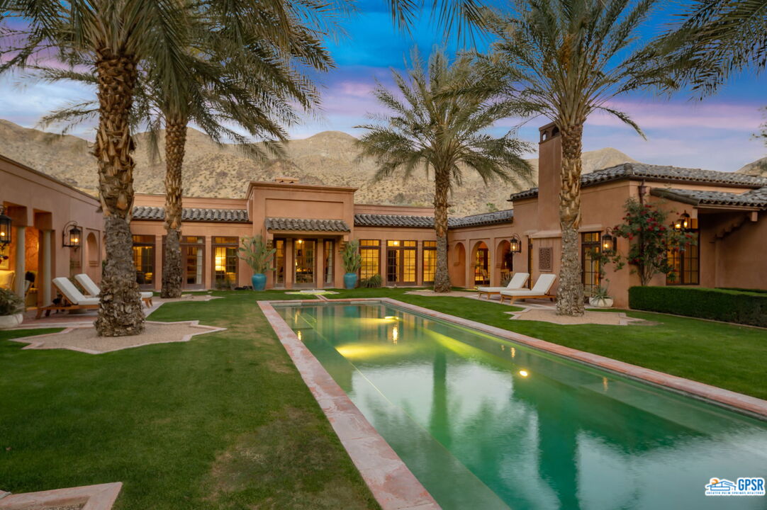 1650 Ave Sevilla Palm Springs, CA 92264 - Photo 65 of 74 a view of a house with swimming pool and porch with furniture
