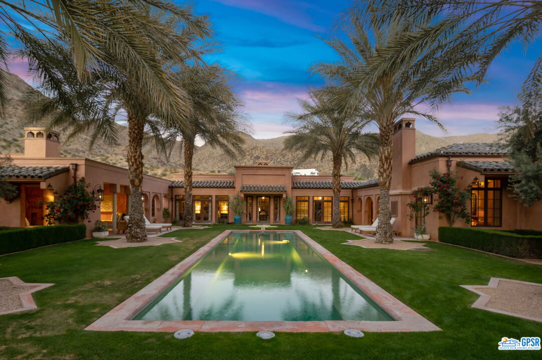 1650 Ave Sevilla Palm Springs, CA 92264 - Photo 67 of 74 a view of yard with swimming pool and green space