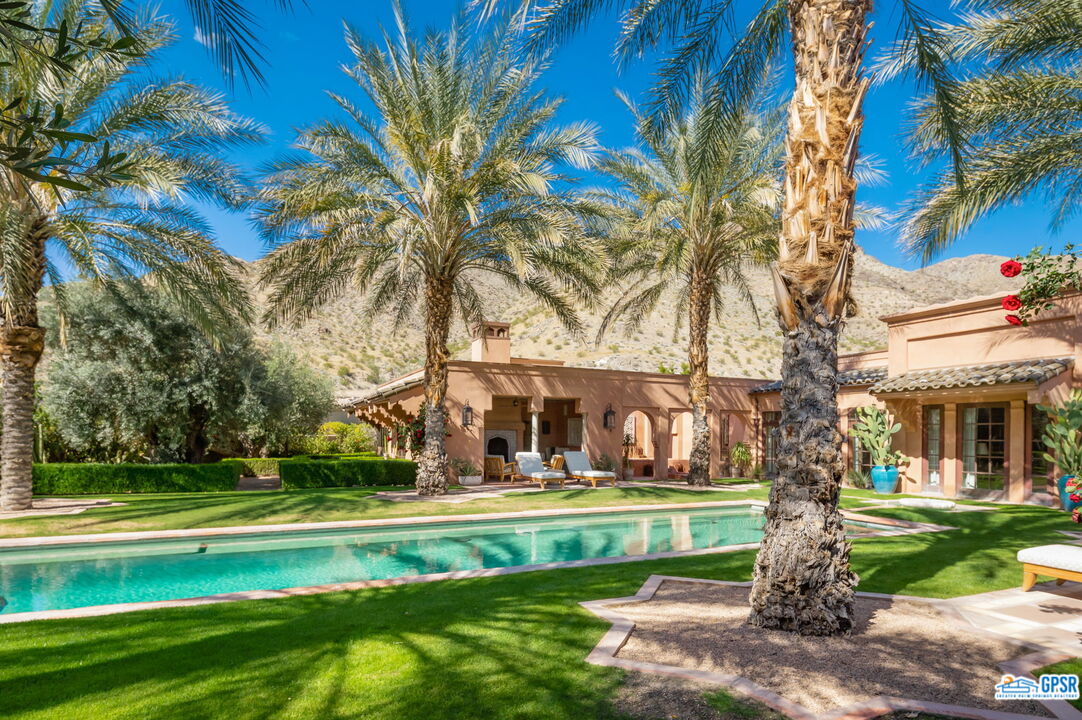 1650 Ave Sevilla Palm Springs, CA 92264 - Photo 10 of 74 a front view of a house with a yard