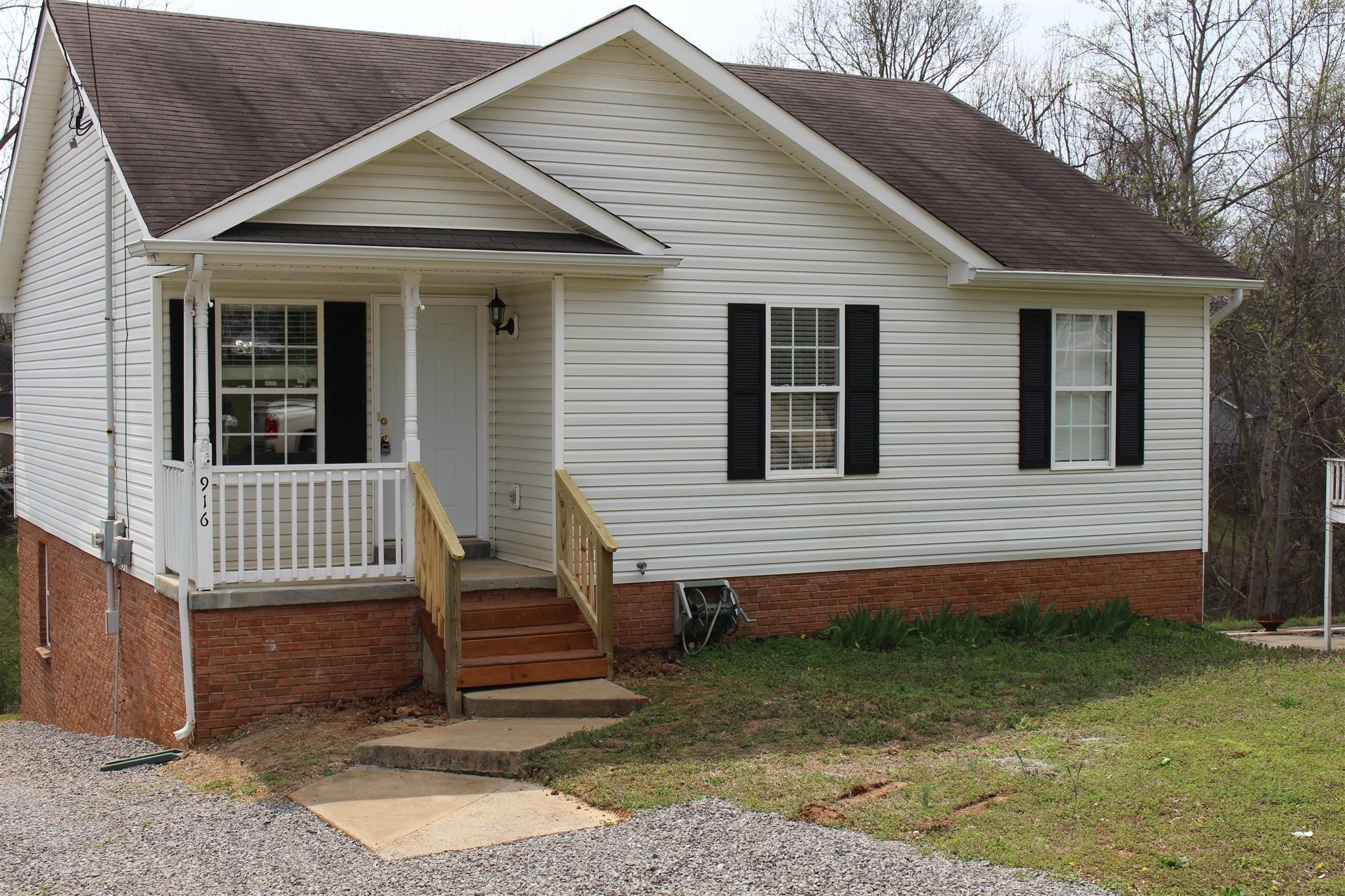 916 Granny White Road Clarksville, TN 37040 - Photo 1 of 19 a view of a house with a yard
